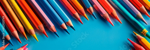 various school supplies like pens, pencils, and markers, representing diversity and versatility. photo