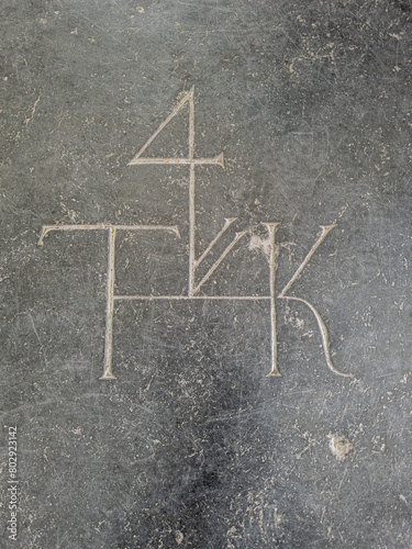 Symbol engraving on a floor slab of the Hooglandse Kerk in Leiden photo