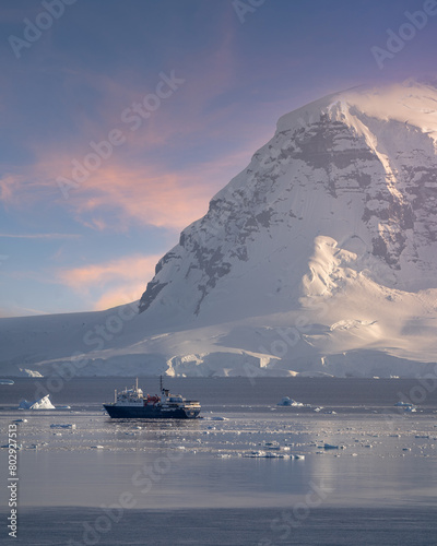 ship at sunset in antarctica