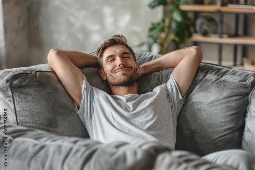 Caucasian men relaxing in the sofa, enjoying the day off Caucasian men relaxing in the sofa, enjoying the day off