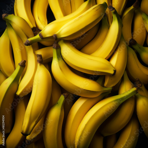 Close up of fresh yellow bananas upper view background. Realistic photo of top view fruits scenery. 