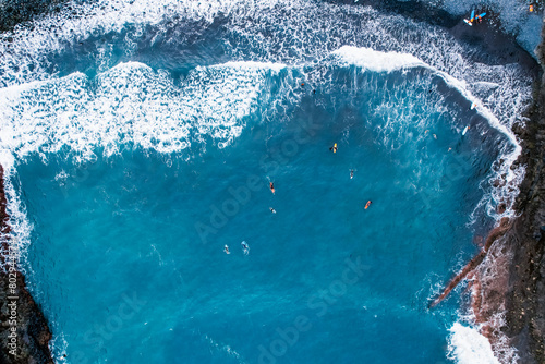 Aerial view of rough ocean with waves. Popular surfer's beach Praia da Alagoa Porto da Cruz, Madeira, Portugal photo