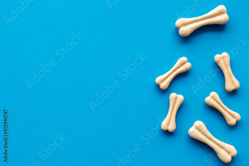 Food and treats for pets - chew bones, top view