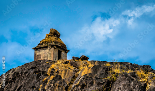 Demolished Temple on a big rock inside Kavaledurga Fort photo