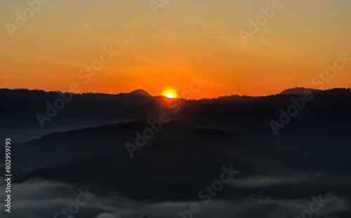 Enchanting Sunrise and Sea of Mist Atop Gunung Silipat in Aiyoeweng, Betong, Thailand.