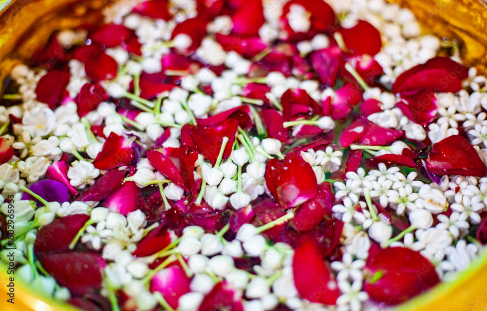 Golden bowl used in rituals in Thailand. Silver bowl in a floating tank with flowers. Used during Songkran festival. Golden bowl used in rituals in Thailand. Silver bowl in a floating tank with flowers. Used during Songkran festival.