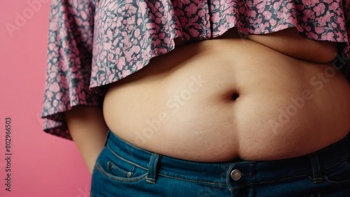 Strong and plump woman happy in the gym while training. Body positivity. Progress for all physicists. Body care and physical well-being. Food and exercise.