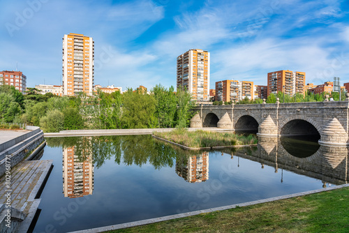 Skyline of the city of Madrid next to the bridge that crosses the Manzanares River to the south of the city.