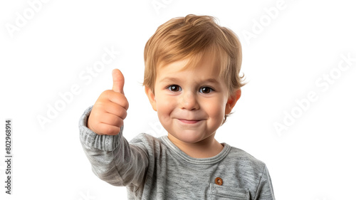 Joyful toddler giving a thumbs up isolated on transparent png background.

