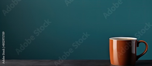 A copy space image of a mug filled with black coffee standing alone against a plain background