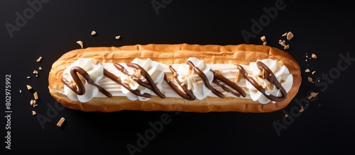 A cream filled eclair is se...