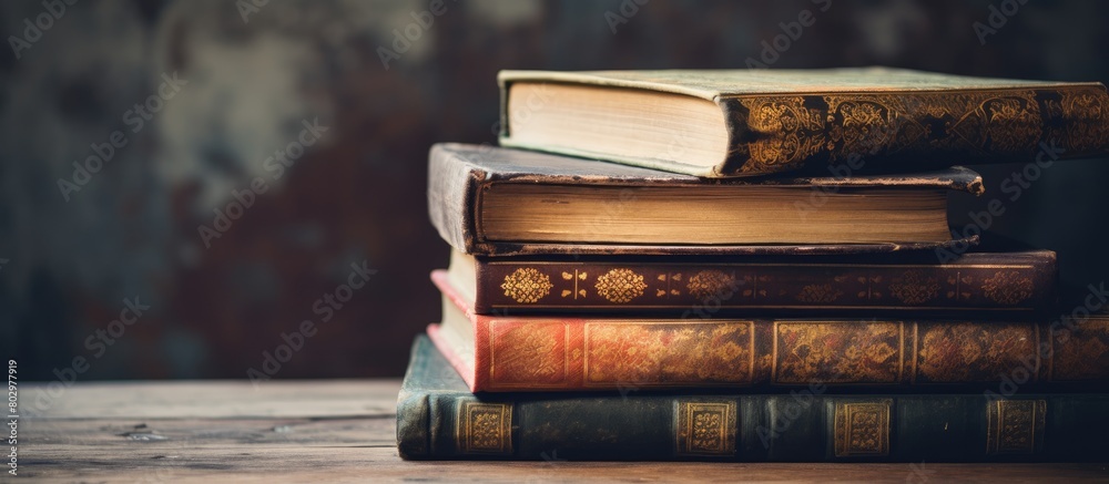 A copy space image showing books resting on a table A copy space image showing books resting on a table