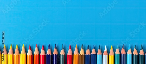 A colorful row of pencils a...