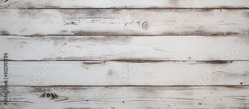 A copy space image featuring a textured white wood plank background