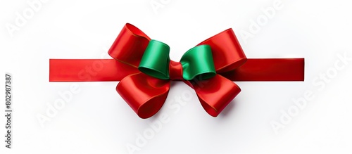 A colorful gift bow in red ...