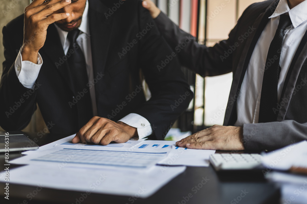 Businessman is stressed with paperwork in the office. Businessman is stressed with paperwork in the office.