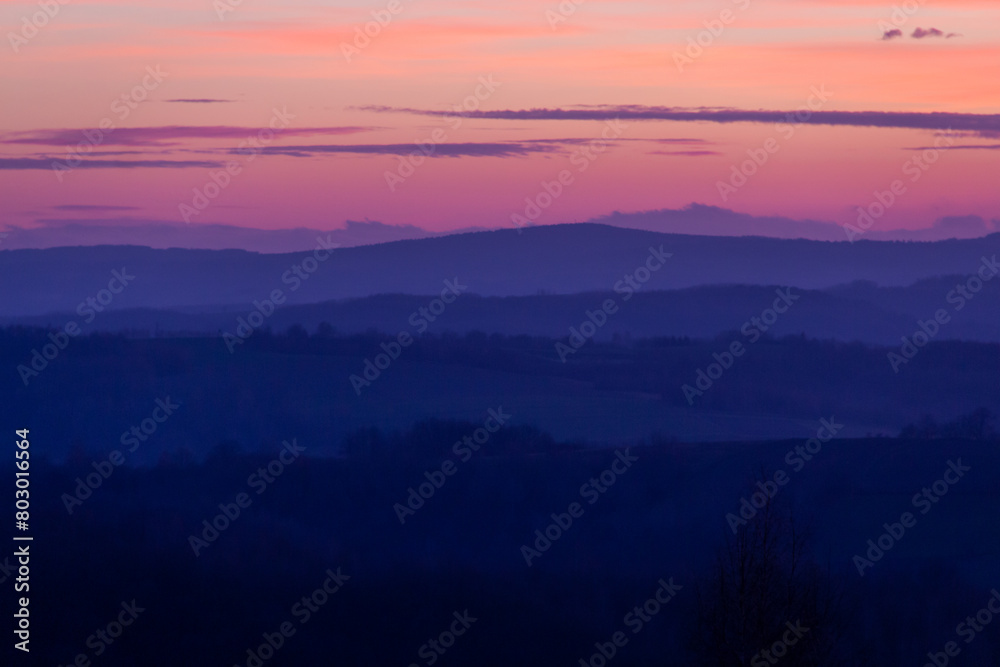 Purple sunset over the hills.