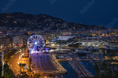 Cannes France Cote d'Azur.View of the city and port at night in Cannes. © Kateryna