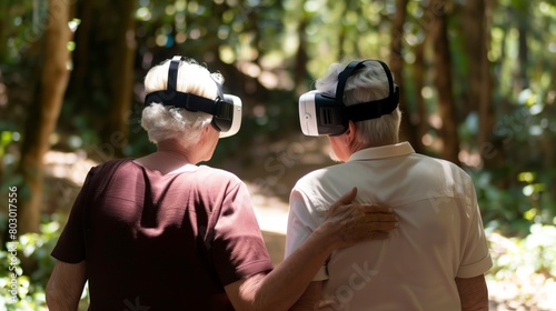 Elderly couple exploring virtual reality in the forest