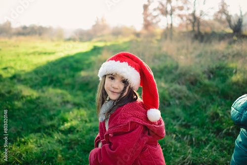 lovely smiling girl with christmas hat
