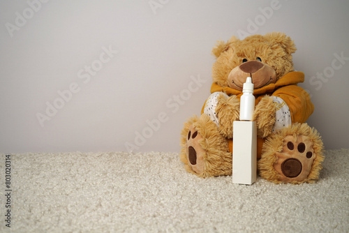 White box, white bottle, teddy bear. Packaging mockup, children's theme.