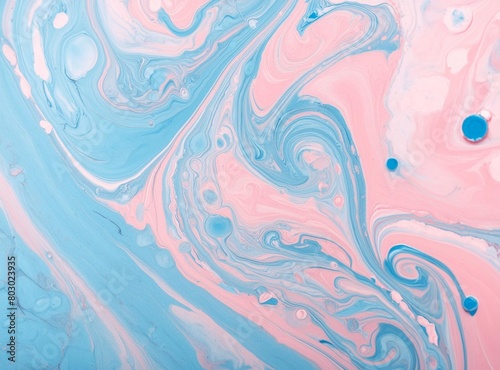 Abstract background with pink and blue swirls of liquid paint. Pastel colored fluid art paint.