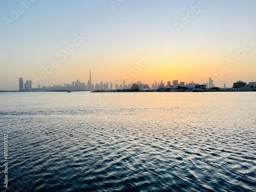 Photography City river at the sunset time, silhouette of the cityscape at the river, twiligh