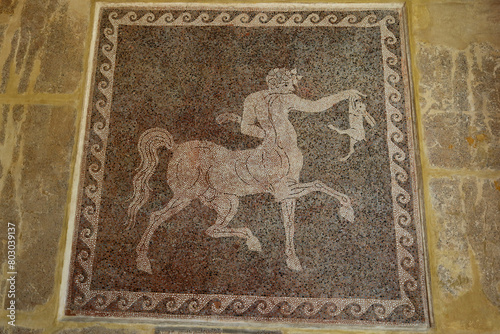 Rhodes, Greece - August 10, 2017: Mosaic of a centaur with a rabbit in the Museum of Rhodes, Greece.