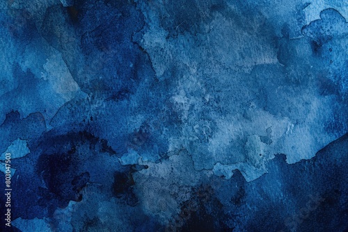 An electric blue, crumpled paper with a grey pattern in the darkness