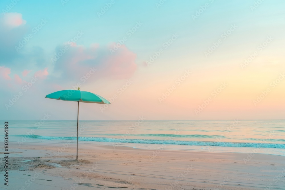 Serene Beach at Sunrise with Pastel Sky and Beach Umbrella, Tranquil Morning Seascape, Copy Space