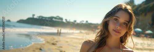 Caucasian woman in bikini looking at camera with confidence at the beach. photo