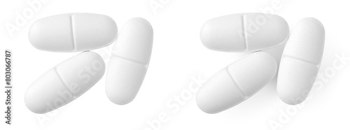White oval pills isolated on white background, top view.