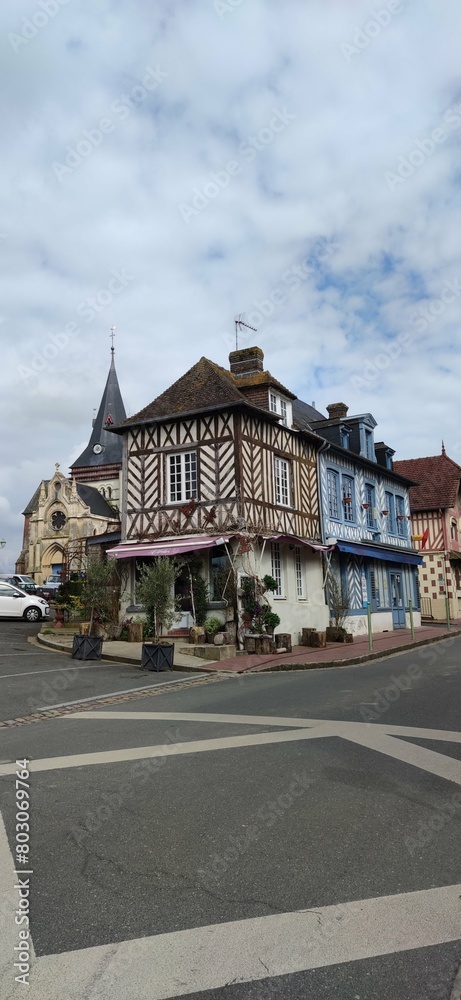 Facades of the houses of Beaumont-en-Auge, travel in Normandy, France