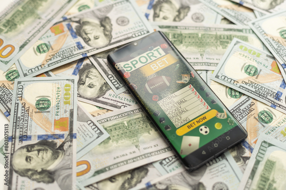 betting on sports, smart phone with working online betting mobile application