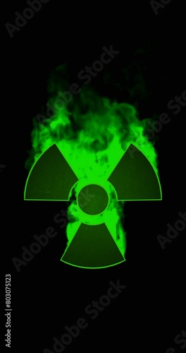 Nuclear / Radiation symbol slowly flashing while emitting green smoke