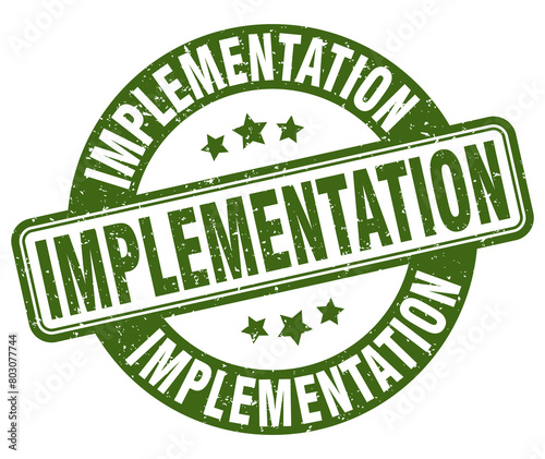 implementation stamp. implementation label. round grunge sign