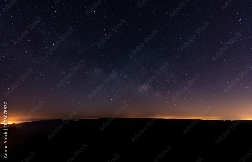 Night view from hilltop with shiny stars