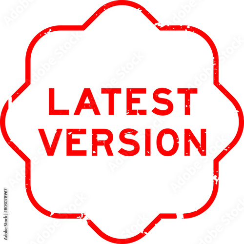 Grunge red latest version word rubber seal stamp on white background