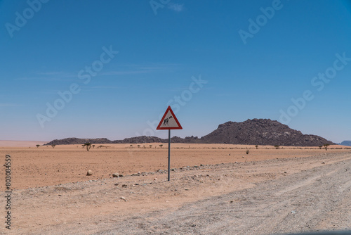 Giraffe warning sign along the C27, Namibia photo