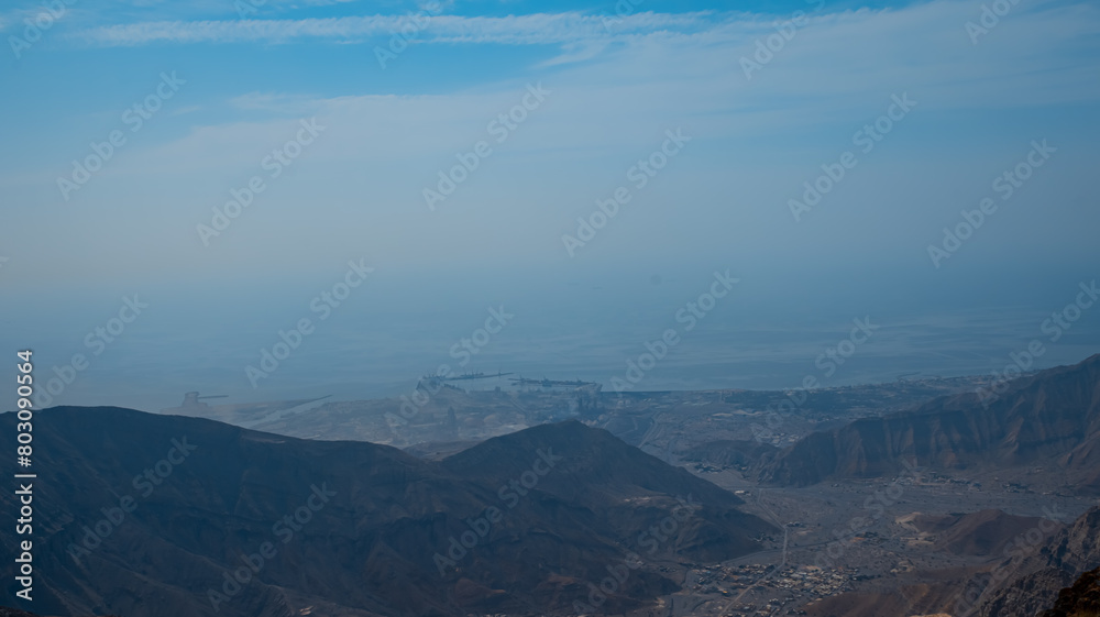 Jebel jais mountain, Majestic Rocky Mountains Under Clear Blue Sky During a Sunny Day