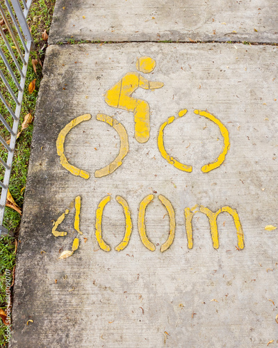 400m bike lane printed on the concrete floor at the park.