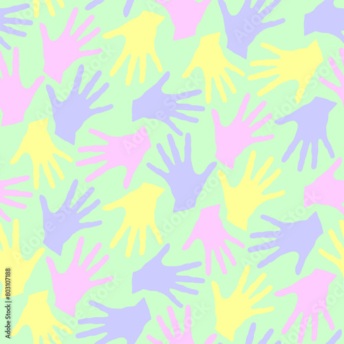 Seamless pattern with palm prints. Symbol of racial and national equality, friendship, happy childhood, world peace, unity of peoples and globalization.
