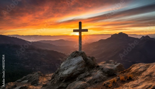 A Stone Cross Embedded in the Rugged Terrain of a Mountain Peak