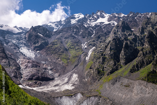 Skazsky glacier and the source of the mountain river Skazdon. The Tsey Gorge. Republic of North Ossetia — Alania, Alagirsky district, Russia photo