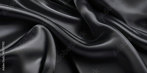 Luxurious black smooth silk or satin texture background. Black silk wave and curve background.
