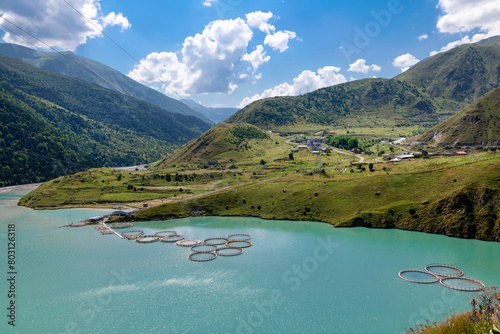 Fisheries at the reservoir of the Zaramagskaya HPP in the Kassar gorge. North Ossetia - Alania. Russia photo