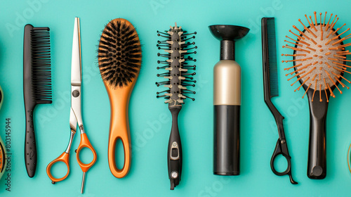 Hair curlers brush combs and scissors on color background photo