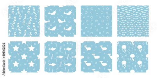 Set underwater seamless pattern. Shark, whale, algae, sea star, wave, bubble, dolphin, narwhal, jellyfish. Blue color