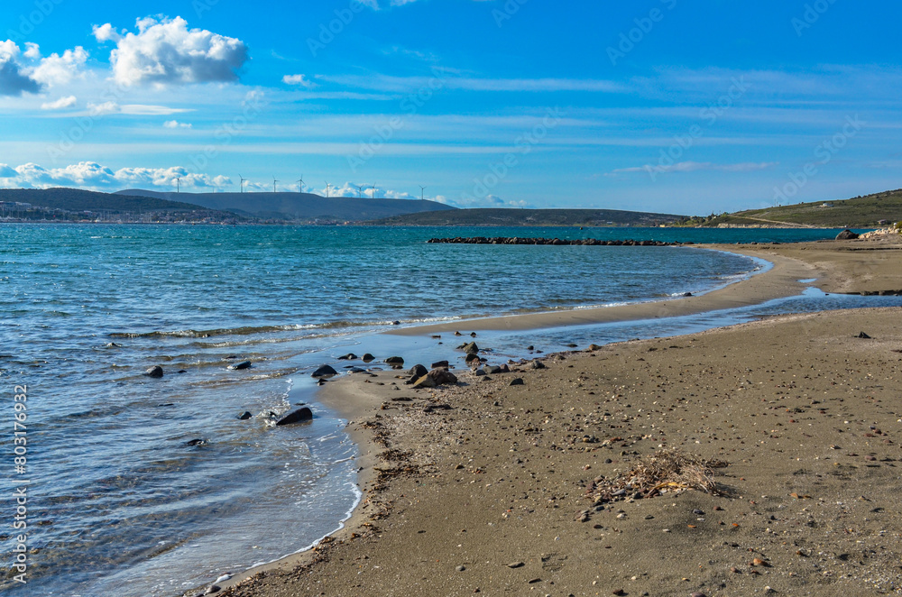 sand beach on Yumru Koyu Bay coast in Alacati (Izmir province, Turkey) sand beach on Yumru Koyu Bay coast in Alacati (Izmir province, Turkey)