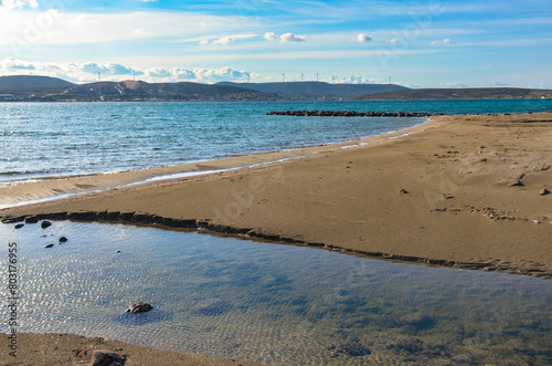 Fototapeta Naklejka Na Ścianę i Meble -  sand beach on Yumru Koyu Bay coast in Alacati (Izmir province, Turkey)	